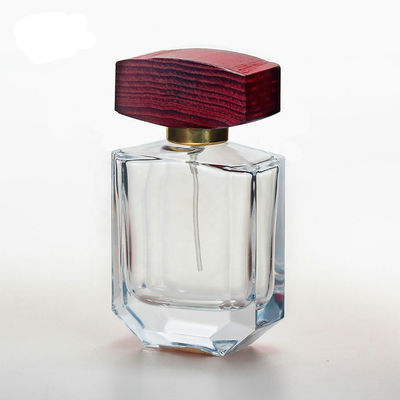 50ml 모자와 펌프 스프레이 칼라가있는 투명 유리 향수병 나무 모자