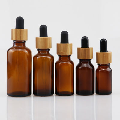 대나무 점적기 배려 피부 브라운을 가진 100ml 정유 유리제 화장용 병