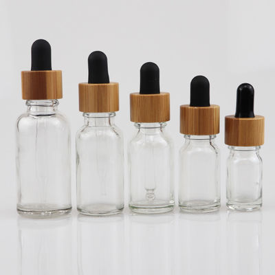 대나무 점적기 배려 피부 브라운을 가진 100ml 정유 유리제 화장용 병